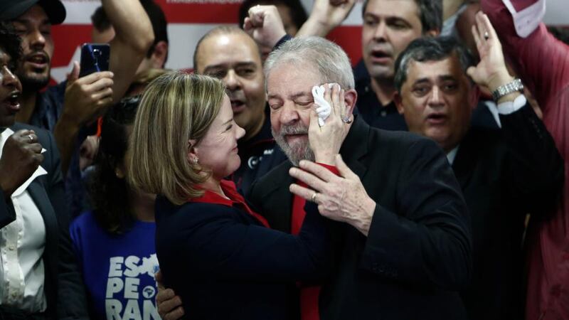 Corruption conviction: Gleisi Hoffmann of the Workers’ Party with Lula on Thursday. “Any election without the participation of President Lula is a fraud,” she warned. Photograph: Miguel Schincariol/AFP/Getty
