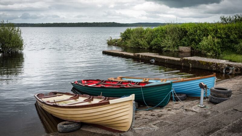 Wooden rowboats in a small marina on Lake Melvin in Co Leitrim.