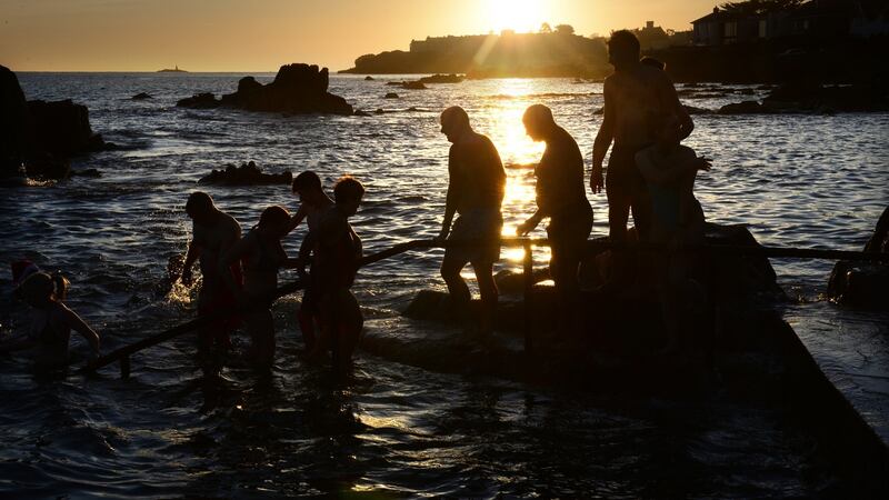 Enjoying a Christmas swim at the forty foot, Sandycove, Co Dublin on Christmas morning. Photograph: Dara Mac Dónaill / The Irish Times