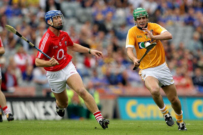 Cork's Ronan Curran and Shane McNaughton of Antrim in action during the All-Ireland quarter-final in 2010. Photograph: Cathal Noonan/Inpho 