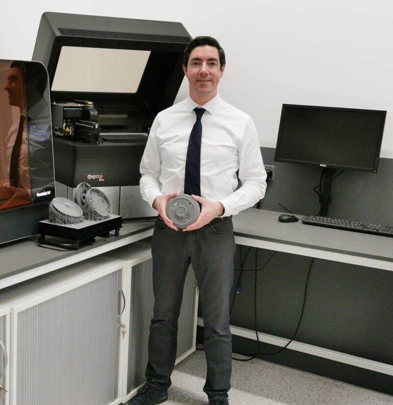 Moore at one of Ei Electronics 3D printing stations