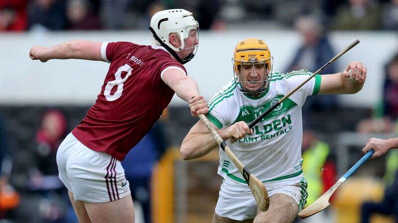 Aaron Maddock tries to tackle Ballyhale’s Colin Fennelly. Photograph: Bryan Keane/Inpho