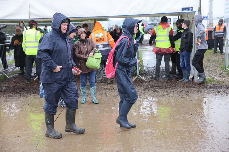 Waterproof overalls and jackets were equally as popular as the wellington boots. Photograph: Dara Mac Dónaill/The Irish Times