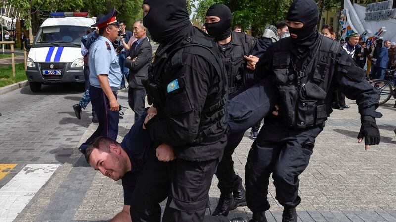 Policemen detain an opposition supporter during a protest rally in Almaty, Kazakhstan on May 10th, 2018. Photograph: REUTERS/Mariya Gordeyeva