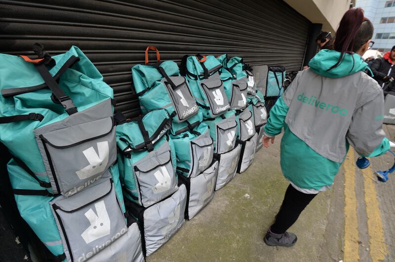 Food delivery companies recruit riders by promising maximum flexibility, and offering a simple onboarding process with no language criteria. Photograph: Alan Betson 
