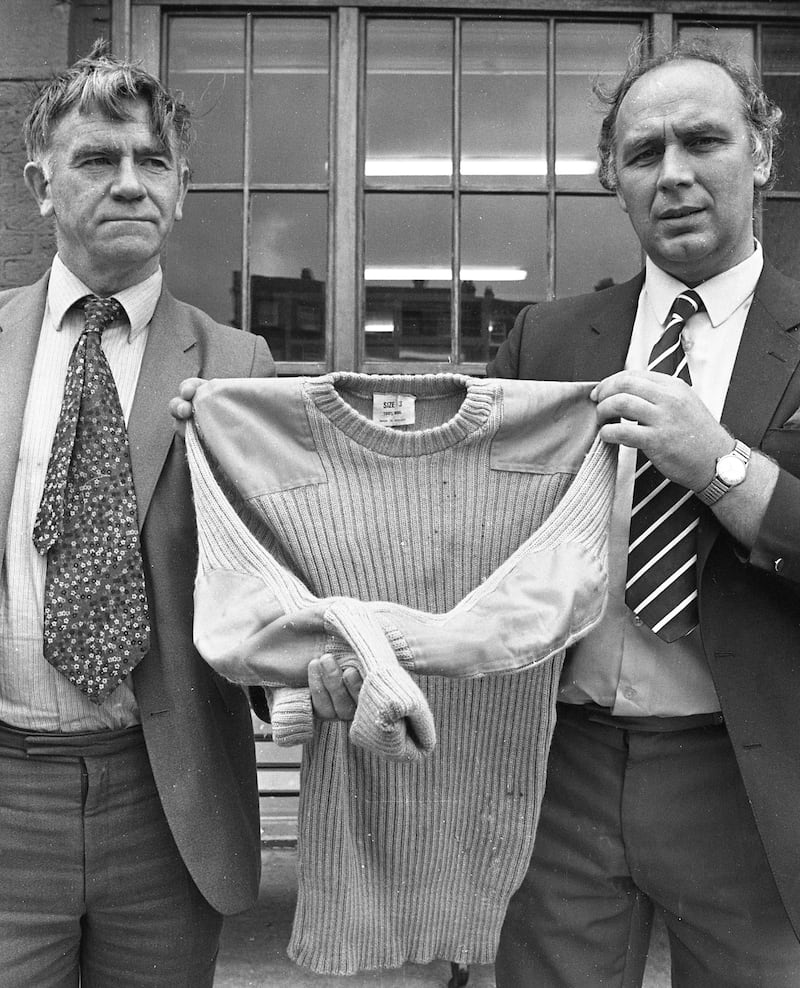 Det Supt John Courtney and Det Garda Cahal Murphy with a sweater similar to the one worn by Bridie Gargan's killer. Photograph: Getty 