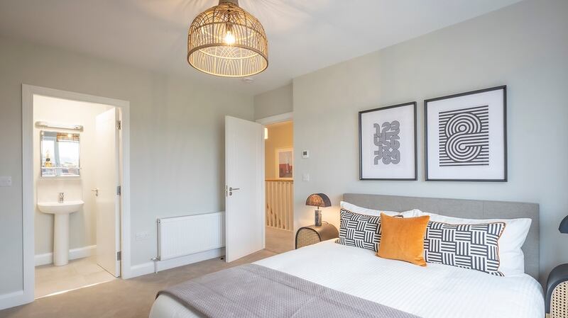 Master bedroom with en suite in  three-bed entry level house.