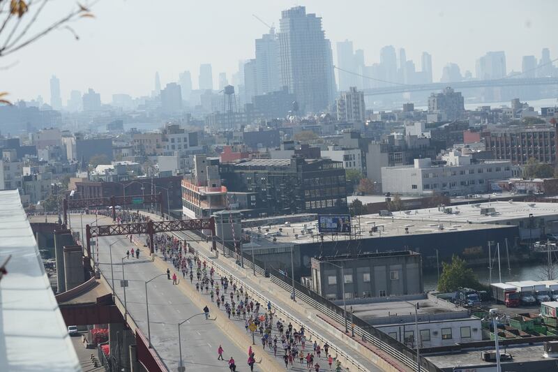 Runners cross the Pulaski Bridge during the New York City Marathon. Photograph: Michelle V. Agins/The New York Times