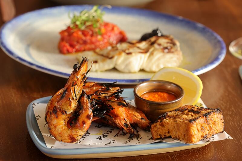 Grilled gambas, garlic and chilli dip, toasted focaccia and Arbequina oil. Photograph: Alan Betson 

