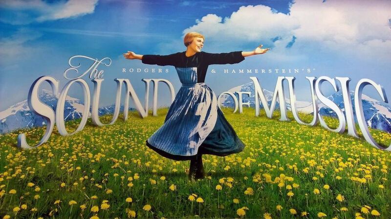 Julie Andrews depicted in the original poster for The Sound of Music (1965)