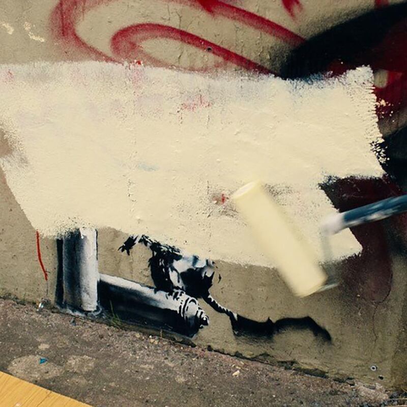 Banksy: Christopher Walken paints over the artwork in The Outlaws. Photograph: Big Talk/Four Eyes/PA Wire