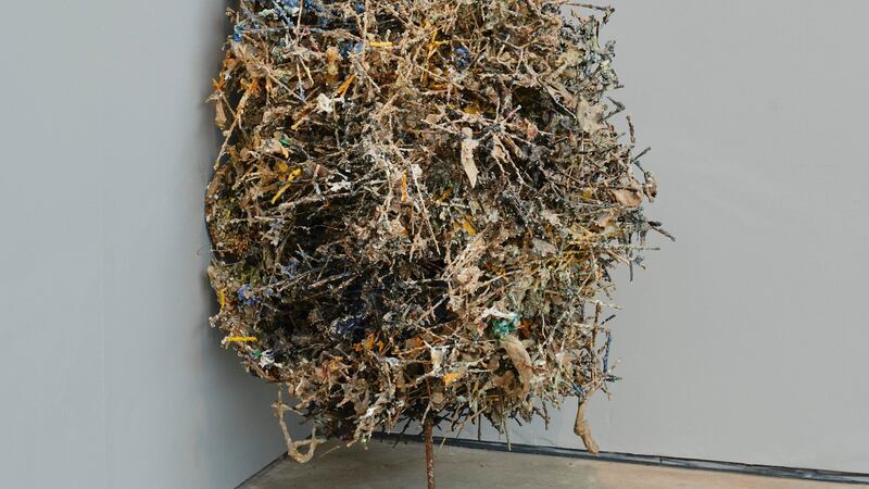 Leaning Porcupine: Rebar, wood skewers, glue, ash, plywood, card wads, cartridges, 2014