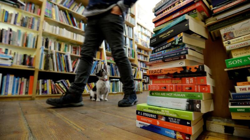Books piled up in The Last Book Shop on Camden Street: Ebook sales in the UK fell 3 per cent in 2017. Photograph: Alan Betson