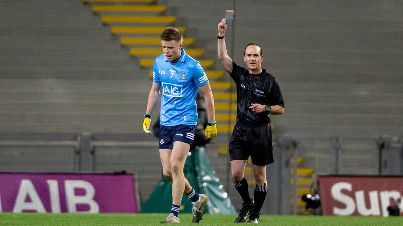 Referee David McGoldrick shows a black card to Dublin’s Robbie McDaid just before half time. Photograph: Morgan Treacy/Inpho