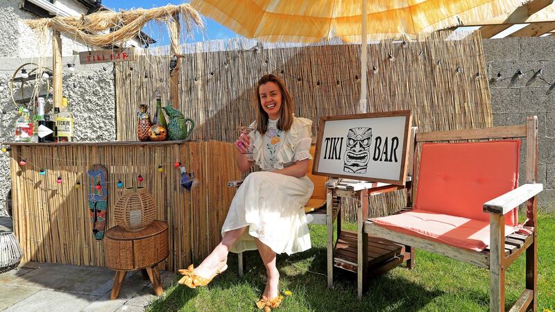 Katrina Carroll with her DIY tiki bar at her home in Walkinstown, Dublin. Photograph: Donall Farmer