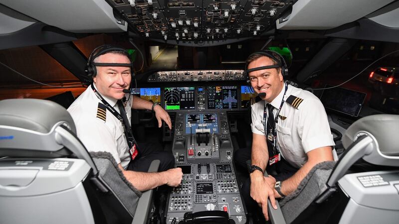 Qantas pilots captain Sean Golding and first officer Jeremy Sutherland in the cockpit of the plane in New York before completing a non-stop test flight to Sydney. Photograph: Qantas/AFP/Getty Images.