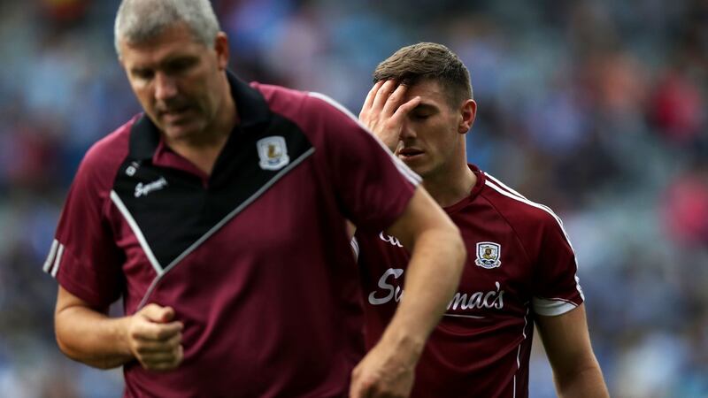 Galway manager Kevin Walsh and  Shane Walsh at the end of the All-Ireland SFC semi-final defeat to Dublin at Croke Park. Photograph:  Tommy Dickson/Inpho