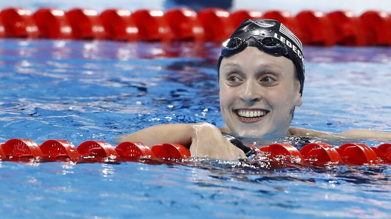 Katie Ledecky celebrates after breaking the world record in winning the  800m freestyle final in Rio. Photograph:  Odd Andersen/AFP/Getty Images