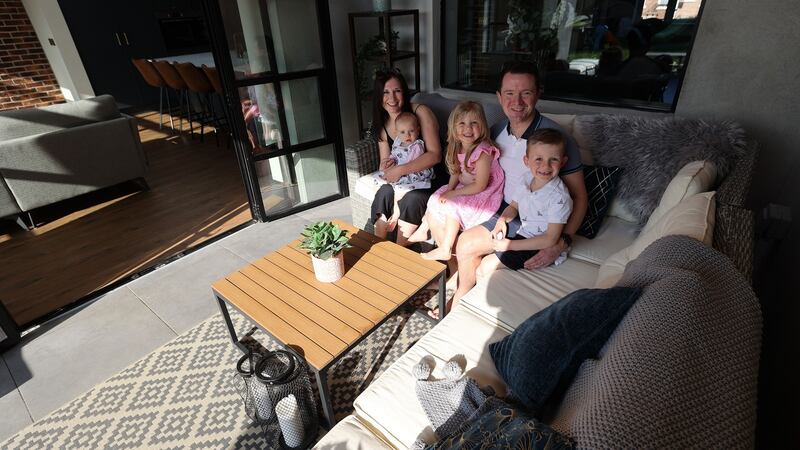 Sinéad Ní Mhurchadha and Bryn Griffiths, Nia,  Saren  and Rhys in their garden room in Goatstown, Dublin 14. Photograph: Nick Bradshaw