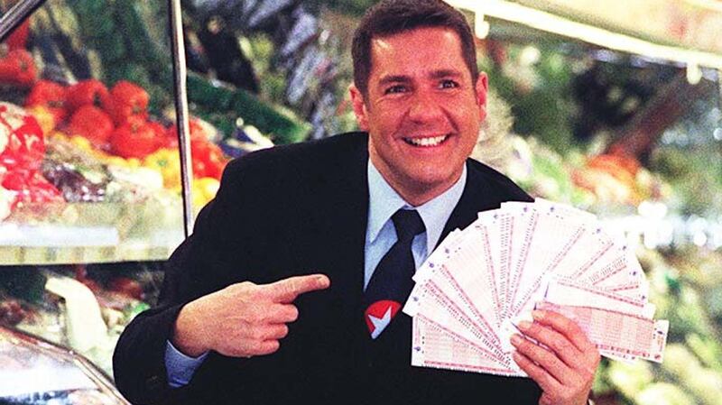 Dale Winton doing a “Supermarket Sweep” in Brent Cross, London, to promote the UK national lottery in 1997. Photograph: Tony Harris/PA Wire
