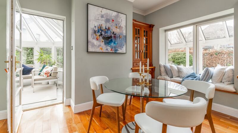 The dining room leads to the conservatory