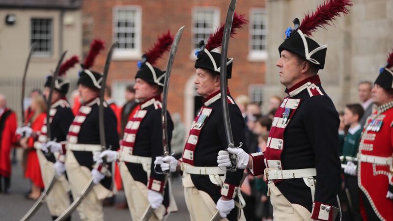A guard of honour by the Hillsborough Fort Guard before a ceremony at Hillsborough Castle to officially rename the village Royal Hillsborough. Photograph: Niall Carson/PA Wire