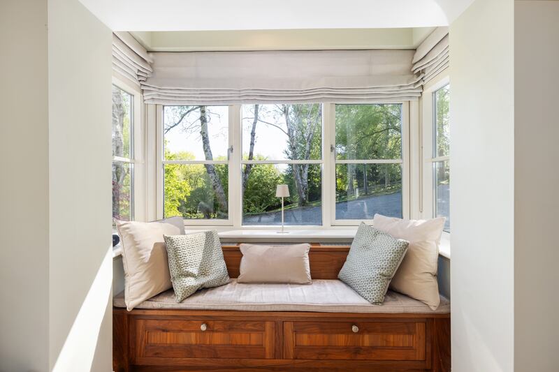 Bespoke window seat in one of the box bay windows