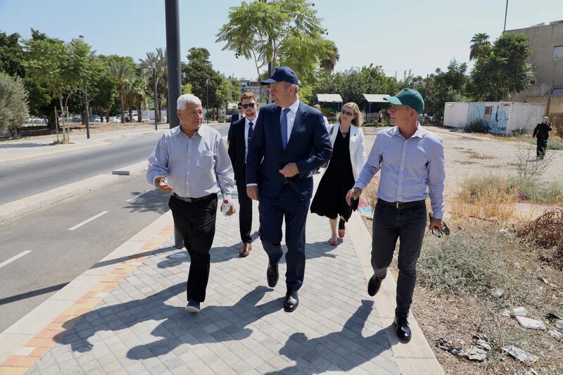 Tánaiste Micheál Martin on a walk-about in the ancient city of Lod, which has both Arab and Jewish communities. Photograph: Phil Behan/DFA