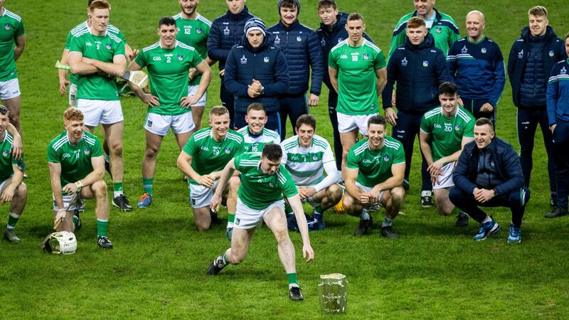 The Limerick team and captain Declan Hannon with the Liam MacCarthy Cup after their win over Waterford in the All-Ireland SHC Final at Croke Park. Photograph: Tom Honan