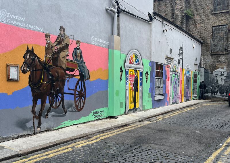 Murals along part of the street. Photograph: Alan Betson