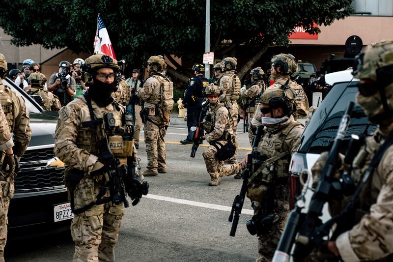 Law enforcement agents in Los Angeles during protests. Photograph: Mark Abramson/The New York Times
                      