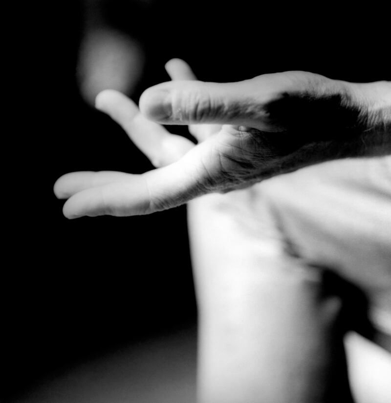 Travelling in a Strange Land: Is every son destined to become his father? Are these shaking hands his after life in me? Photograph by Sonya Whitefield