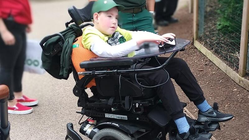 Jason is a full-time wheelchair-user and is fed through a tube. He underwent spinal fusion surgery three months ago, his 20th operation since birth.