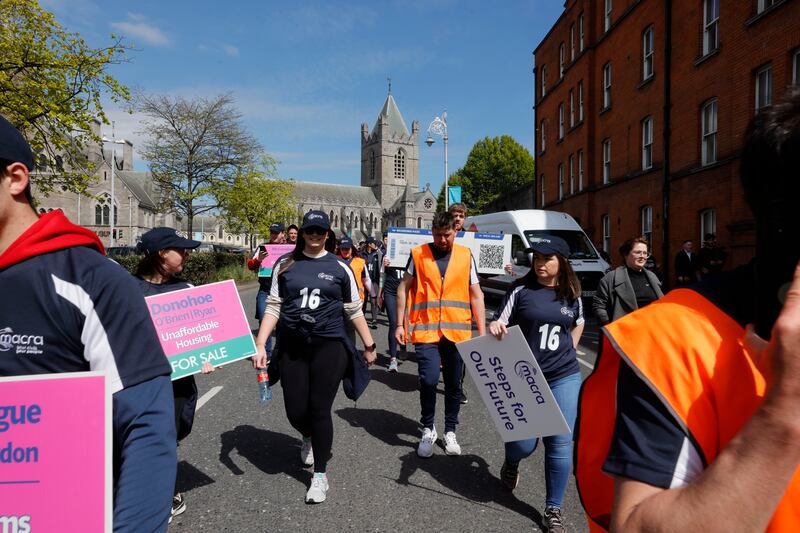 The group passes Christchurch Cathedral in central Dublin. Photograph: Alan Betson / The Irish Times

