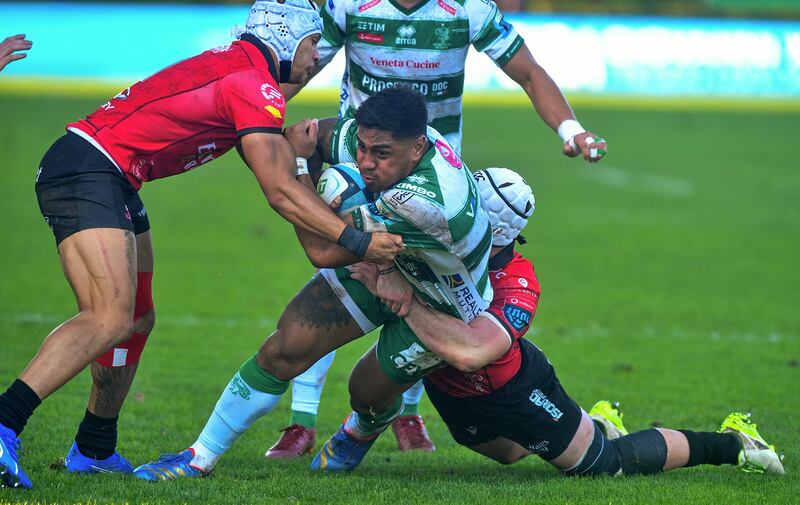 Benetton's Malakai Fekitoa is tackled during a United Rugby Championship game against Emirates Lions at Stadio Monigo. Photograph: Luca Sighinolfi/INPHO