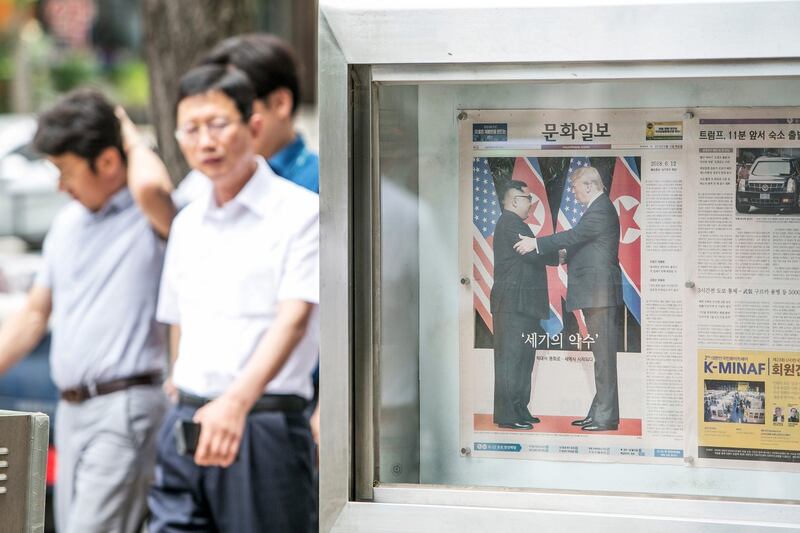 A copy of the Munhwa Ilbo newspaper featuring on the front page a photo of US president Donald Trump and North Korean leader Kim Jong Un shaking hands at the Singapore Summit. Photograph: Jean Chung/Bloomberg