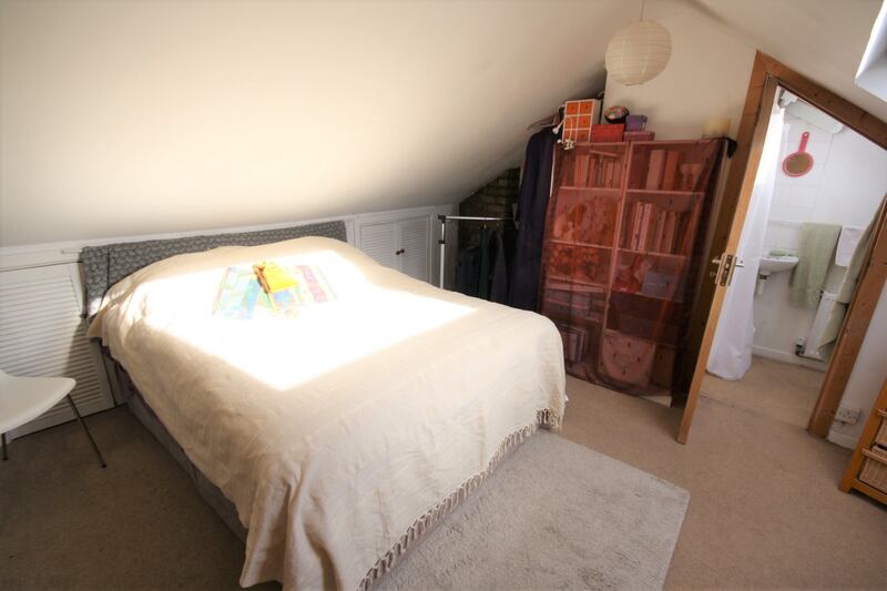 Alton Cottage: the attic bedroom, with its en-suite shower room