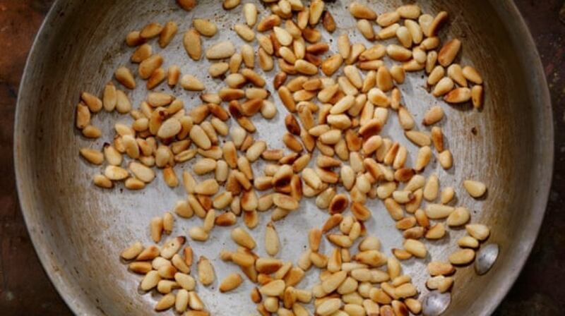 Toasted pine nuts . . . intensify their flavour. Photograph: LauriPatterson/Getty Images