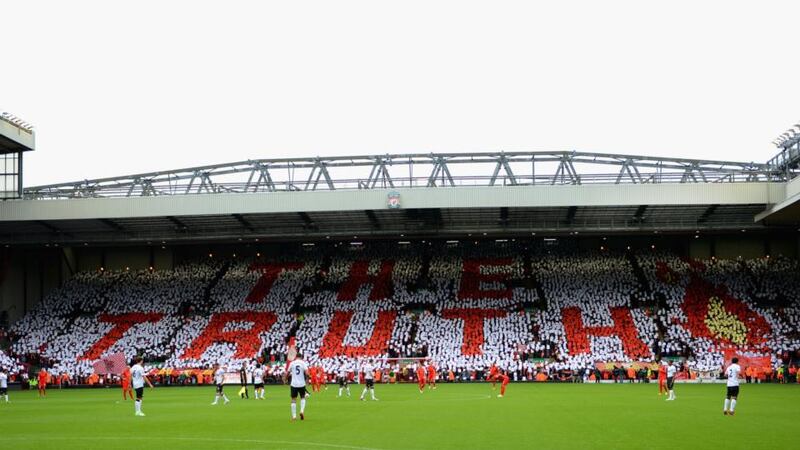 Liverpool fans hold up a mosiac in tribute to the Hillsborough disaster before the Barclays Premier League match between Liverpool and Manchester United at Anfield last September.  Photograph: Michael Regan/Getty Images
