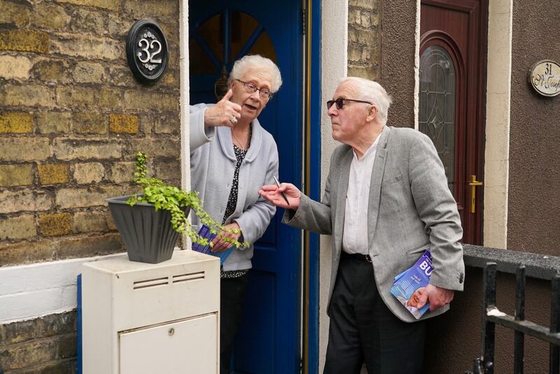 Esther Hyland talks to Christy Burke as he canvasses the north inner city.  Photograph: Enda O'Dowd