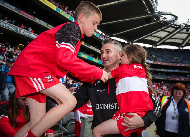Derry manager Rory Gallagher with his kids after the All-Ireland SFC quarter-final game between Derry and Clare at Croke Park on Saturday. Photograph: Evan Treacy/Inpho