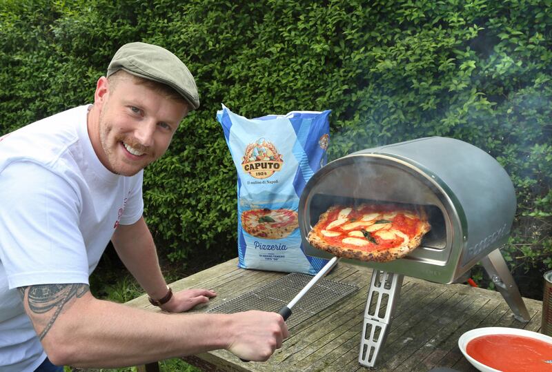Ronan Greaney, co-owner of Dough Bros. Their best-seller is the margarita, followed by pepperoni, then the Hey Pesto. Photograph: Joe O'Shaughnessy
