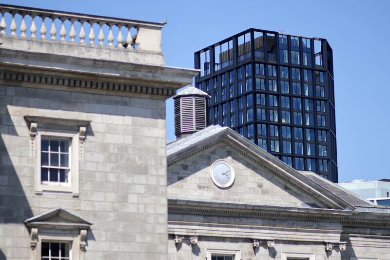 The new Longstone House/College Square building development over the Dublin skyline seen from inside Trinity. Photograph: Chris Maddaloni