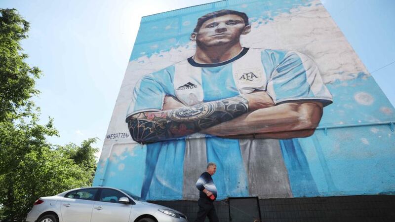 A giant painting depicting Argentina’s Lionel Messi is seen on the wall of the building in Russia during the World Cup. File photograph: Albert Gea/Reuters