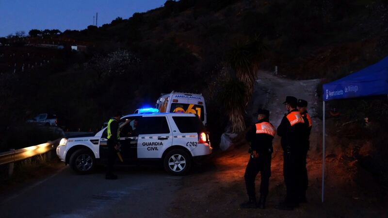 Emergency team members look for a boy fell into the borehole. Photograph: Gregorio Marrero/AP Photo