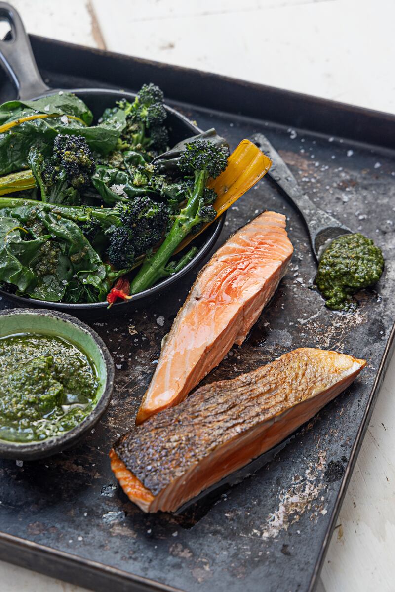 Roasted salmon with pesto-dressed vegetables. Photograph: Harry Weir