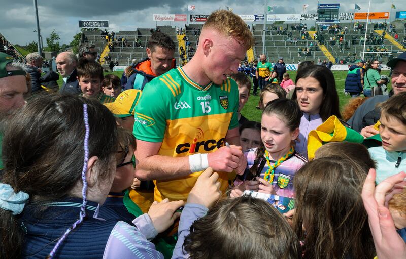 Donegal’s Oisín Gallen signs autographs after the game against Cavan at the start of June. Photo: Lorraine O’Sullivan/Inpho