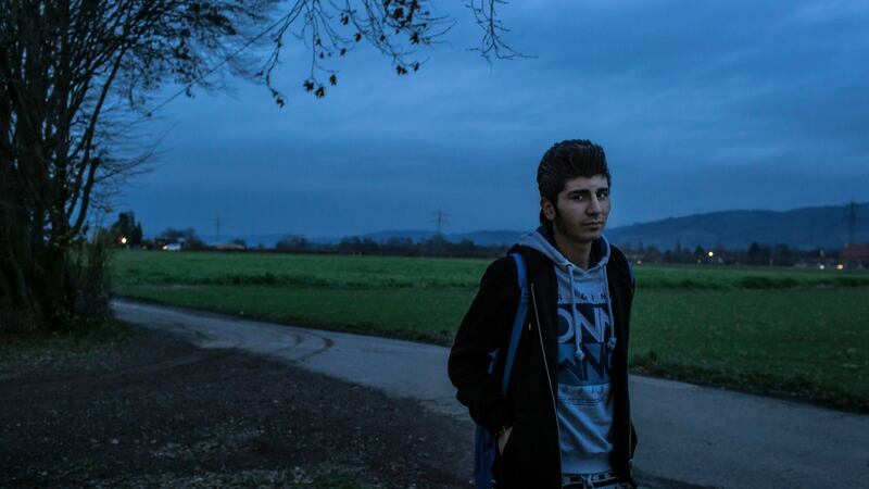 Yasser, a 16-year-old cousin of Alan Kurdi, outside a shelter for unaccompanied minors near Heidelberg, Germany, where he receives benefits such as carpentry classes and excursions. Photograph: Mauricio Lima/The New York Times
