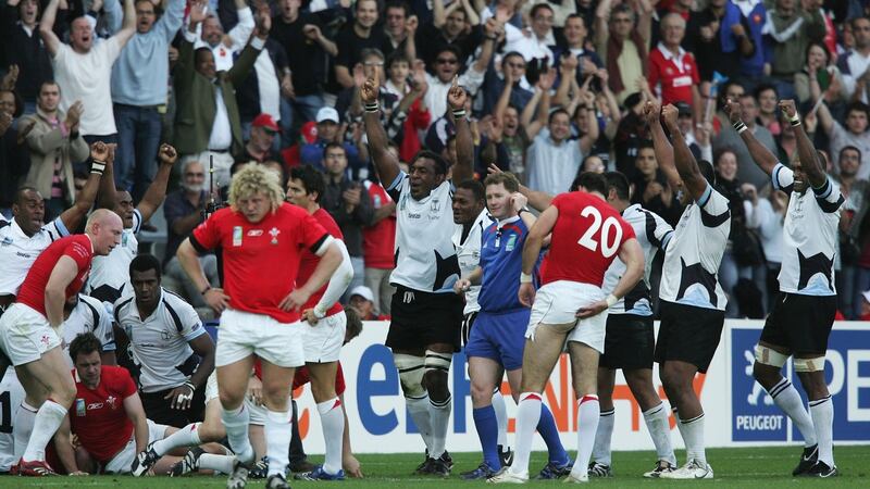Fiji players celebrate their team’s 38-34 victory over Wales in the 2007 Rugby World Cup  at the Stade de la Beaujoire  in Nantes. Photograph: David Rogers/Getty Images