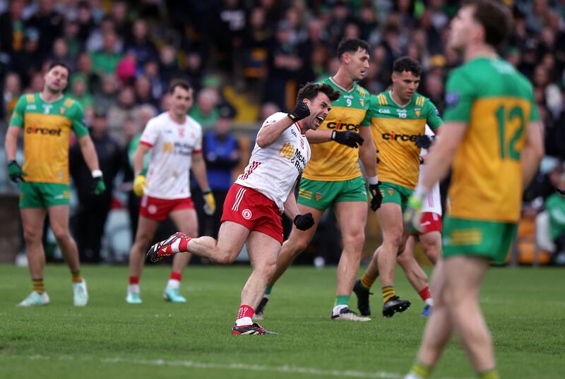 Tyrone's Darren McCurry celebrates a score as the Red Hand County got the better of Donegal in last Saturday's All-Ireland series clash at Ballybofey. Photograph: John McVitty/Inpho